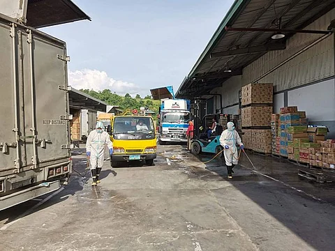 LEYTE. Tacloban Chamber Volunteer Fire Brigade Association Inc. conducts disinfection and sanitation in some business establishments in the city on August 31, 2020. (Photo courtesy of Arjan Antig/Tacloban Chamber Brigade)