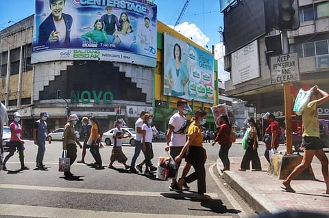 BACK IN BUSINESS. On Sept. 1, 2020, at the start of Cebu City's modified general community quarantine (MGCQ), people from all walks of life were seen going about their lives, running errands, under the so-called "new normal." Passersby on Colon, dubbed as the oldest street in the country, were seen observing the oldest lesson from the Covid-19 crisis: Wear your mask. (Amper CampaƱa)