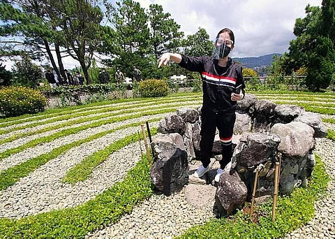LEARNING FROM BAGUIO. Department of Tourism Secretary Bernadette Romulo-Puyat learns from the "new normal tourism" in Baguio while touring the Mirador Jesuit Villa and Retreat House on Wednesday, September 2. Puyat is backing the tourism program between Baguio and Ilocos Region in an effort to achieve a slow and safe return of activities. (Photo by Jean Nicole Cortes)