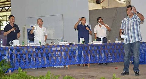 ILOILO. Third district Board Member Matt Palabrica leads the ceremonial toast, which followed the Expression of Commitment by the various municipal mayors of the Province of Iloilo, during the launching of PAIS-Farms and RIsC TrAP at the Mina Sports and Cultural Center in Mina, Iloilo on September 28, 2020. (Capitol PIO)