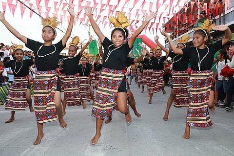 BINULU STREET DANCERS. Aeta street dancers wearing colorful costumes perform during the 14th Binulo Festival. Binulo is the art of cooking using bamboo. (File photo/Chris Navarro)