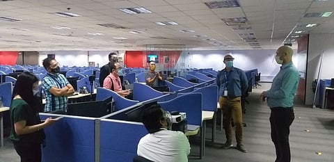 BACOLOD. Transcom Worldwide top executives, Chief Executive Officer for Global English Region Mark Lyndsell (second from right) and Senior Vice President for Client Service Management Craig Buckley (right) in a media briefing at the company's site in Bacolod City Thursday, February 4, 2021. (Erwin P. Nicavera photo)
