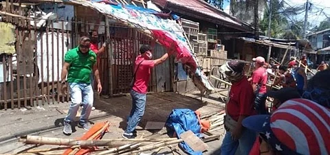 BACOLOD. The Bacolod City Legal Office-Enforcement Team and Market Coordinating and Monitoring Task Force demolish the illegal structures at Bacolod Vendor's Plaza in Barangay 12, Bacolod City Tuesday, March 9, 2021. (Ernesto Pineda)