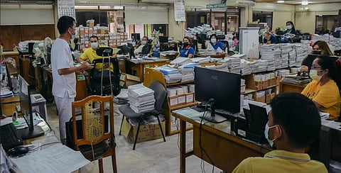 SAN CARLOS CITY. Local health staff conducts Covid-19 vaccine information drive to different local offices at the city hall. (Contributed photo)