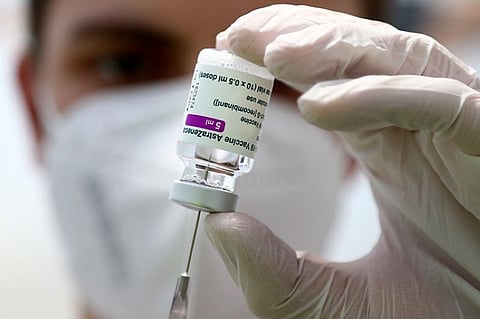 GERMANY. In this March 22, 2021 file photo, a member of the medical staff prepares a syringe with the AstraZeneca coronavirus vaccine, during preparations at the vaccine center in Ebersberg near Munich, Germany. (AP)