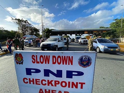 MANILA. Police man checkpoints across NCR, Bulacan, Cavite, Laguna and Rizal to implement enhanced community quarantine restrictions until April 11, 2021. (Third Anne Peralta-Malonzo)