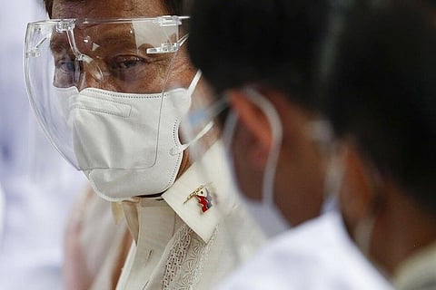 MANILA. President Rodrigo Duterte wears a face mask and a face shield as protection against coronavirus disease 2019 in this photo taken on June 12, 2021. (File)