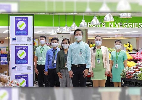 In photo are Jessie Legera, Metro Alabang store manager (center); Irene Montemayor, supermarket manager (third from left); and staff.