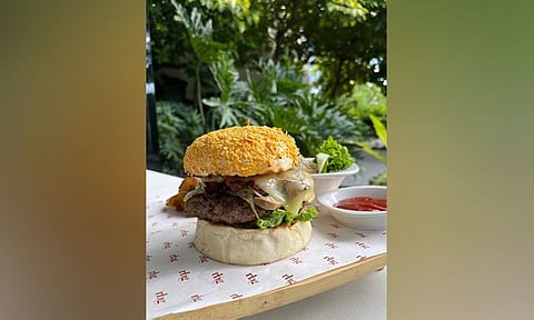 DAVAO. Bite on the monster RBG Burger. (Contributed photo)