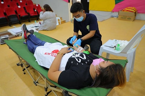 BLOOD DONATION. A volunteer gives blood during the City of San Fernando's fourth blood donation drive. (City of San Fernando Information Office)