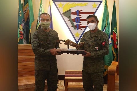 JOB WELL-DONE. Major General Alfredo Rosario, Jr., Western Mindanao Command (Westmincom) chief (left), commends the Joint Task Force (JTF)-Basilan troops for the successful implementation of the Small Arms and Light Weapons (SALW) program in Basilan province. A photo handout shows Brigadier General Domingo Gobway, JTF-Basilan commander (right), handing over a memento to Rosario during the visit of Westmicom chief Thursday, October 7, in Basilan. (SunStar Zamboanga)