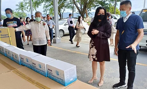 MEDICAL GEAR. SBMA Chairman and Administrator Wilma T. Eisma checks out the donations with MSK Group Work Inc., President Simon Su (right), Teco Representative Michael Peiyung Hsu and SBMA Senior Deputy Administrator for Operations Ronnie Yambao. (Contributed photo)