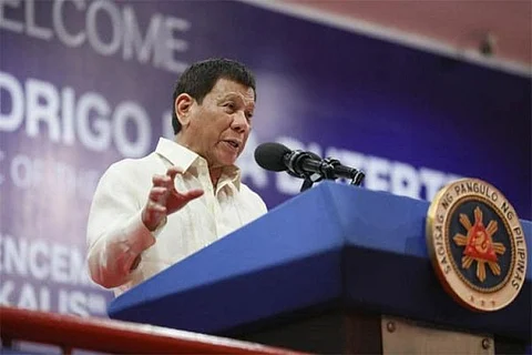MANILA. In this file photom then-President Rodrigo Duterte delivers a message during the Philippine National Police Academy-Justice, Integrity, Service (PNPA) 43rd Commencement Exercises at the Campos Grandstand, Camp General Mariano N. CastaƱeda in Silang, Cavite on April 21, 2022.