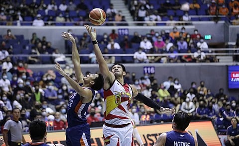 MANILA. San Miguel big man June Mar Fajardo grabs a rebound over a Meralco player in their semifinal game on Wednesday night, August 3, 2022. (PBA)
