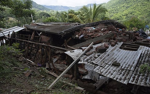 A house damaged by an earthquake is seen in Huizontla, Michoacan state, Mexico, Tuesday, Sept. 20, 2022. A magnitude 7.6 earthquake shook Mexico's central Pacific coast on Monday, centered 37 kilometers (23 miles) southeast of Aquila near the boundary of Colima and Michoacan states and at a depth of 15.1 kilometers (9.4 miles). (AP Photo/Armando Solis)