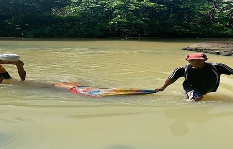 The body of 16-year-old girl believed to have been raped was found stuffed inside a sack floating at a river in Barangay Cabahug, Cadiz City, Negros Occidental Sunday, December 11. (Cadiz City Photo)