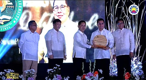 ILOILO. CHMSU Vice President of Academic Affairs Jay Estrellas and Bachelor of Science in Civil Engineering Program Chairperson Engr. Michael Forton receives the Plaque of Recognition on behalf of the university. (CHMSU photo)