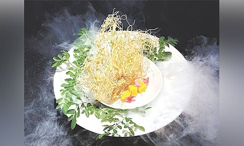APPETIZER. Bohol-farmed prawn and Cebuano mangoes, wasabi fish roe, wasabi cream, malunggay leaves and kataifi noodles.