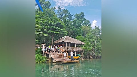 MIDWEST TOUR. Participants wait for their boat ride at the Bojo River in Aloguinsan town during the second day of the Suroy-Suroy Sugbo Midwest tour on Sunday, June 11, 2023. / DELTA LETIGIO