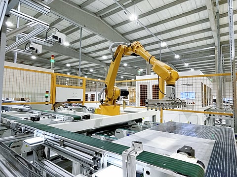 ConfirmWare’s layup systems use gantry-robot pick-and-place mechanisms to position cell strings onto the module stack before bussing. (Photo Credit: ConfirmWare)