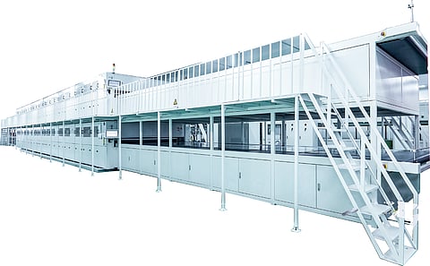 Jinchen’s large-area laminators process multiple modules per cycle, using multi-stage heating and cooling to bond module layers. (Photo Credit: Jinchen Machinery)