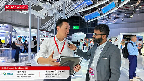 Dr. Bin Fan (left), Founder and Chairman of GCL Optoelectronic, discusses the company's perovskite commercialization roadmap and tandem technology developments with Shravan Chunduri (right), Head of Technology at TaiyangNews, during an interview at SNEC 2026. (Photo Credit: TaiyangNews)