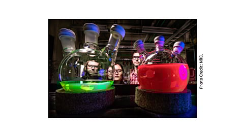 Traditional research on perovskites has been on hybrid organic-inorganic structure, but the recent NREL research focuses only on all-inorganic perovskite solar cells, which is hoped to solve the stability issues of the organic-based variant. NREL's Ashley Marshall, Erin Sanehira and Joey Luther with solutions of all-inorganic perovskite quantum dots, showing intense photoluminescence when illuminated with UV light.