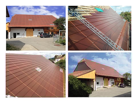 Terracotta-red solar tiles integrated into the roof of this Fribourg, Switzerland-based farmhouse are expected to generate 28 MWh of clean energy per year, which would be only 20% less than traditional PV technology but are more beautiful. (Photo Credit: Center For Microelectronics and Microtechnologies (CSEM)