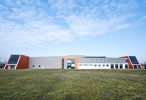 Oxford PV is producing commercial sized tandem perovskite/silicon solar cells at its pilot production line.  A new research project funded by Germany is aimed at optimizing the process to prepare for mass production. (Photo Credit: Oxford PV)