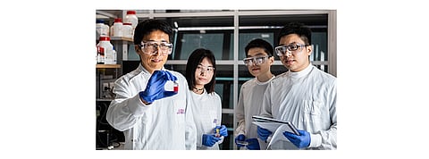 The UQ research team led by Professor Lianzhou Wang along with Shanshan Ding, Mengmeng Hao and Dr Yang Bai (from left to right) see the 16.6% efficiency level for quantum dots as offering an opportunity to use this technology as transparent skin for a number of applications in the future. (Photo Credit: The University of Queensland)