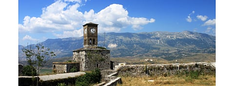 Albanian hydropower producer KESH has been seeking to add solar power capacity to its presently operational Vau i Dejes hydropower plant. Pictured is a clock tower in the countryside of Albania. (Photo Credit: LindaSaitos/www.goodfreephotos.com)
