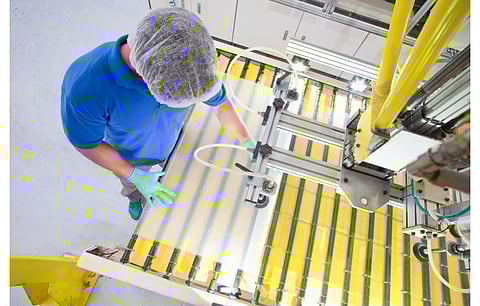 India’s current operational solar cell production capacity is around 2.5 GW and module capacity is between 9 GW to 10 GW annually, which is not enough to meet the demand for solar, according to Fitch Solutions as developers still prefer imported products. (Illustrative Photo; Photo Credit: Juice Flair/Shutterstock.com)