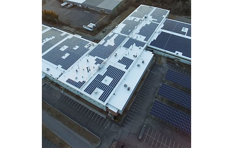 Greenbacker’s latest purchase of 16.3 MW DC rooftop solar portfolio in Massachusetts comprises 2 assets with panels on adjacent parking structures. (Photo Credit: Greenbacker Captial Management LLC)