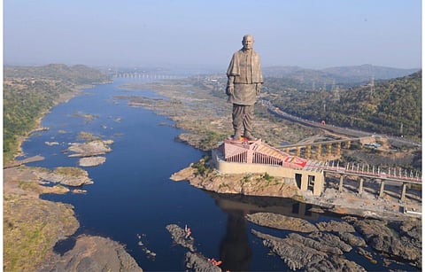 After attracting INR 2.30 per kWh as the lowest winning bid in its phase XIV auction, GUVNL has now launched renewable energy tender under phase V. Projects can be located anywhere in Gujarat. Pictured is the Statue of Unity in Gujarat’s Narmada district. (Photo Credit: Narmada District Administration)