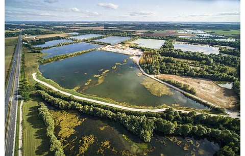 RES Group developed 66 MW Les Ilots Blandin floating solar plant in France will now be executed by Q ENERGY France on former gravel pits. (Photo Credit: Q ENERGY Solutions SE)