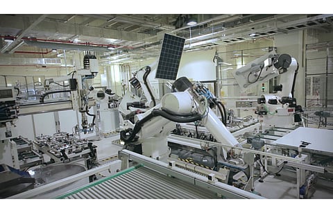 Pictured is REC Solar’s, a Reliance group company, fully automated solar panel production fab. Reliance has now announced investment in US based perovskite company Caelux to use its proprietary technology for high efficiency modules. (Photo Credit: REC Solar Holdings AS)
