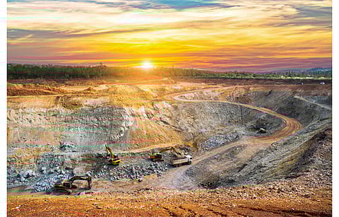 DOE plans to offer up to 50% of the project cost for clean energy demonstration projects on mine lands selected under its $450 million funding round. Pictured is an aerial view of an opencast mining quarry. (Illustrative Photo; Photo Credit: Red ivory/Shutterstock.com)