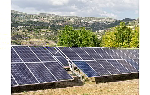 Pictured is a solar array installed on the edge of a hill in Cyprus. Now the country has launched a tender for 2.96 MW PV capacity. (Illustrative Photo; Photo Credit: Shujaa_777/Shutterstock.com)