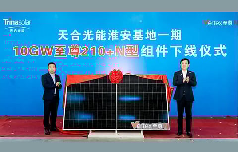 Leaders from Trina Solar and members from Huai'an Municipal Committee unveil the first module produced by Trina’s Huai’an facility. (Photo Credit: Trina Solar)