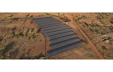 Pictured is the NextSource solar farm with its Molo Mine in the background. (Photo Credit: NextSource Materials Inc)