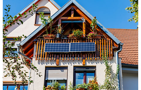 VDE says its testing and certification of balcony PV systems is available with immediate effect. Pictured are solar panels on the balcony wall of a vintage house in Germany. (Photo Credit: nnattalli/Shutterstock.com)