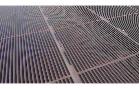 Targeting to install 7.3 GW solar power capacity by 2030, EWEC has launched a tender for 1.5 GW AC Al Khazna Solar Plant. (Illustrative Photo; Photo Credit: SkyMediaPro/Shutterstock.com)