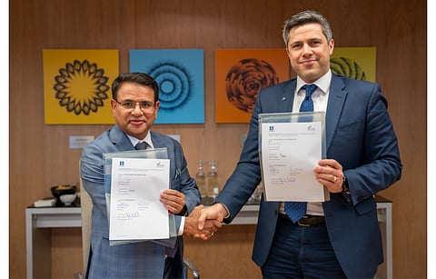 Pictured is Acme’s Manoj Upadhyaya (left) and Yara’s Magnus Ankarstrand (right) with the signed agreement for green ammonia supply. (Photo Credit: Yara International ASA)