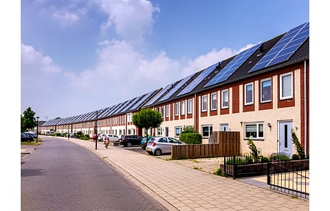Pictured are row houses in the Netherlands with solar panels. The country’s hugely successful net metering scheme for solar is announced to be ended in 2027. (Illustrative Photo; Photo Credit: www.hollandfoto.net/Shutterstock.com)