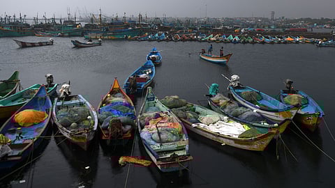 Fishermen anchor their boats in preparation ahead of cyclone Nivar