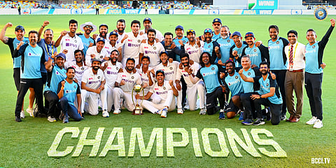 Indian players posing for a picture with the Border-Gavaskar trophy after historic series win against Australia