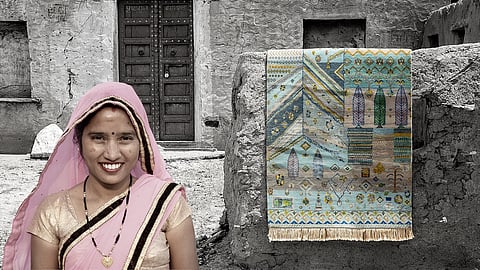 A Rajasthani artisan employed in making rugs