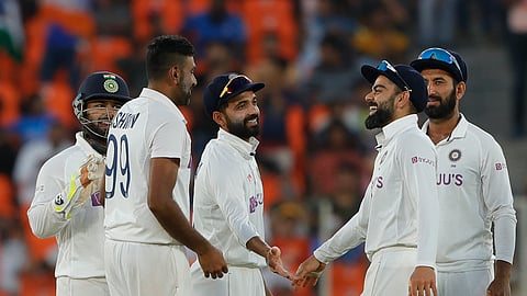 India team celebrating after taking a wicket on the second day of third test in Ahmedabad