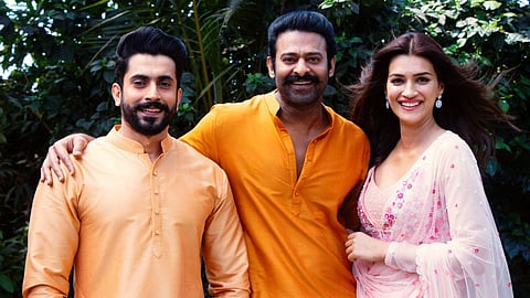 Welcoming Sunny Singh (L) and Kriti Sanon (R) onboard 'Adipurush,' Prabhas (C) share this picture of himself with the two actors