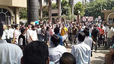 Employees of Canara Bank protesting in Lucknow on Monday